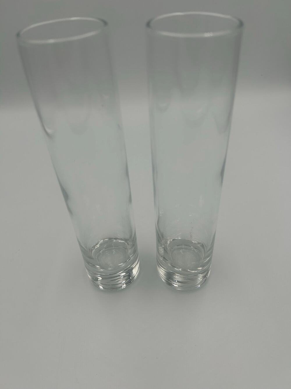 Matching set of 2 clear glass cylinder bud vases with thick weighted base